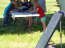 WY Section Manager Garth Crowe, N7XKT running the voice station, powered by solar, with an eager group of scouts and kids listening in.